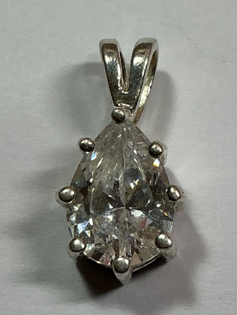 Sterling Silver Teardrop Shaped Pendant. 3/4 inches long
